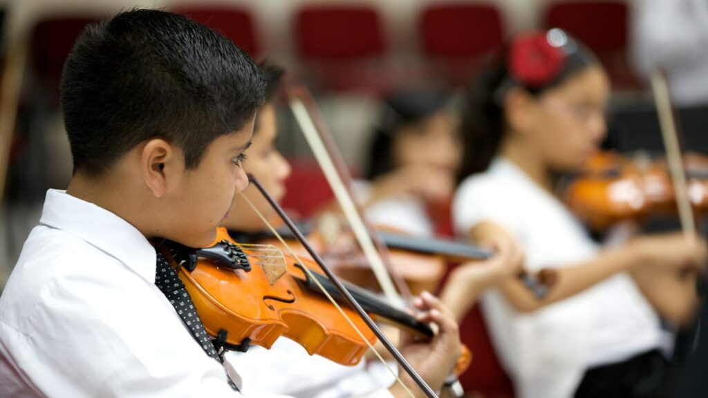 Kid playing violin