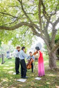 Image of String Quartet Playing Outdoors